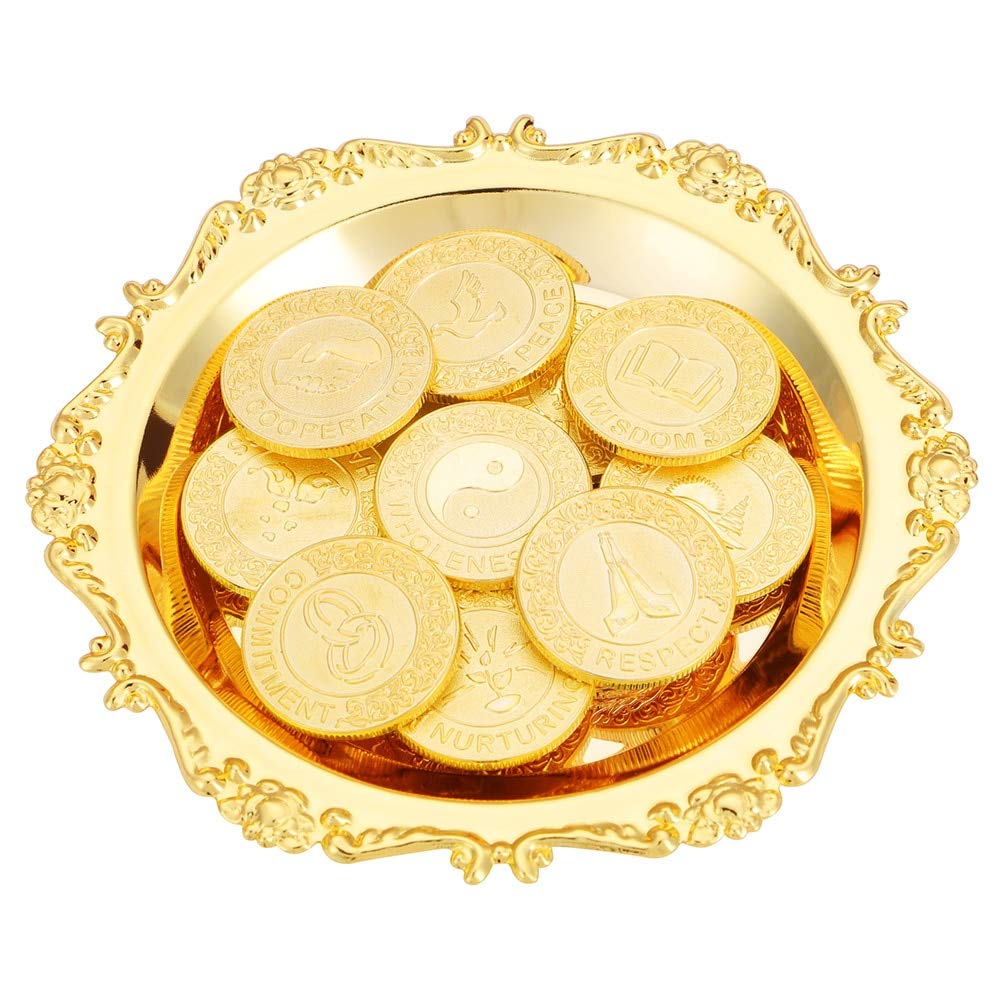 A transparent glass filled with gold coins.