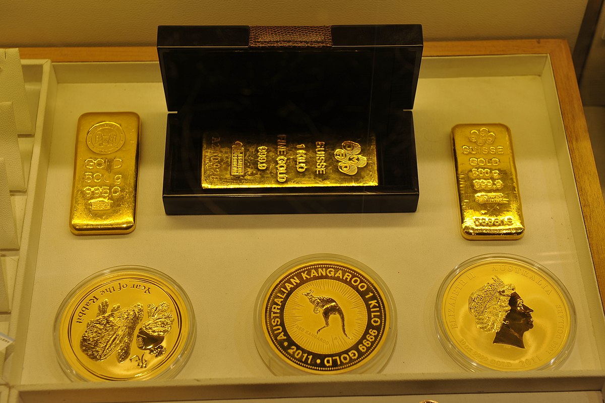 Image of gold bars and coins
