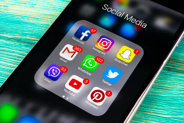 Social media icons or a smartphone with social media apps